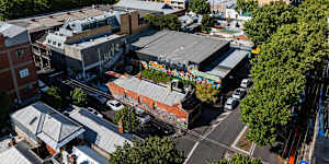 The property at 430-434 George Street,Fitzroy,includes the showroom and the double-storey warehouse at the rear.
