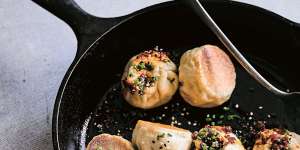 Pan-fried and steamed pork baozi.