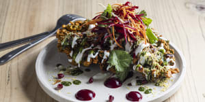 Kale chips battered in chickpea flour,with beetroot puree and drizzled with a trio of chutneys.