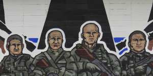 A mural in Serbia reads:“Wagner Group,Russian knights”.