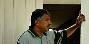 The photograph Kate Geraghty took of Kareem Challur defending the Australian embassy in Baghdad in 2004.