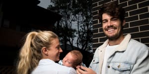 Sydney Swans midfielder George Hewett and partner Alice Summers with their son,Henry.