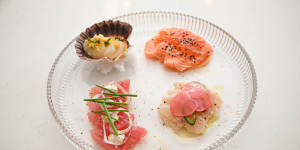 A tasting plate of raw tuna,salmon,kingfish and scallop relies too heavily on sauces and garnishes.