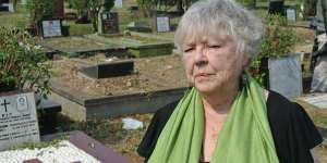Shirley Shackleton visiting the grave of her dead husband at the Tanah Kusir cemetery in Jakarta.