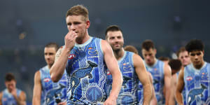 North Melbourne skipper Jack Ziebell leads his side from the ground in round 10.