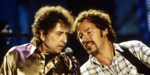 Bob Dylan and Bruce Springsteen perform together in 1995. Springsteen wrote Dylan a fan letter.