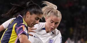 Colombia’s Catalina Usme,left,and England’s Alessia Russo challenge for the ball.