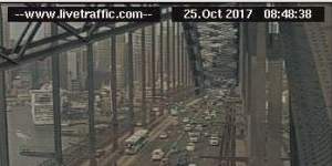 Heavy traffic after car,motorbike collide on Sydney Harbour Bridge during morning peak