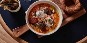 Emils’ Turkish eggs with sujuk sausage and simit bread.