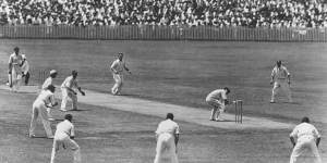 W. M. Woodfull of Australia ducks to avoid a rising ball from Harold Larwood of England.