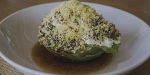Iceberg lettuce glossed by brown butter and a shallot dressing.