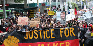 A Melbourne protest over the death of Kumanjayi Walker on November 13,2019 - the same day Constable Zach Rolfe was charged with murder.