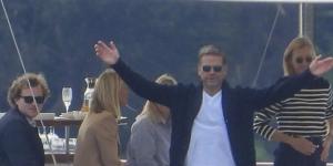 Murdoch on his yacht,Istros,in Sydney Harbour in June this year,seemingly annoyed at the attention of the paparazzi.