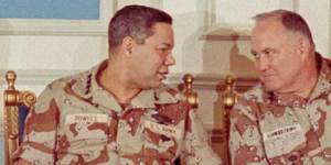 Stormin'Norman ... General Colin Powell,left,confers with General H. Norman Schwarzkopf in Saudi Arabia on Feb. 8,1991.