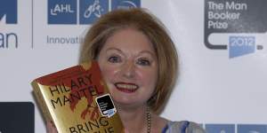 Hilary Mantel,winner of the Man Booker Prize for Fiction,poses with a copy of her book Bring up the Bodies.