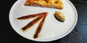 Potato focaccia with Ortiz anchovies and green olive butter.