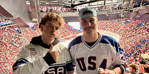 Jason Greenleaf (right) and Archibald Erickson,from Maine,at the USA-Canada ice hockey match in Montreal.