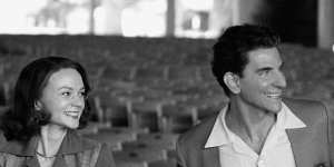 Carey Mulligan as Felicia Montealegre and Bradley Cooper as Leonard Bernstein in Maestro.