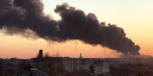 A cloud of smoke rises after an explosion in Ukraine.
