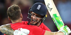 Jos Buttler and Alex Hales celebrate England’s victory.