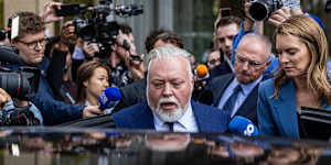 After a bruising hearing,Kyle Sandilands enters his Rolls-Royce,which has an estimated value of near $1 million.