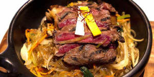 Grilled beef with sweet potato noodles.