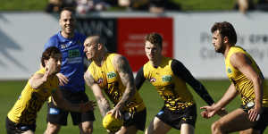 Tigers champion Dustin Martin was in the thick of the action at Richmond training on Saturday.