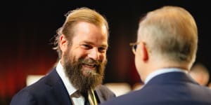 Elsom speaks to Prime Minister Anthony Albanese at the government’s Jobs and Skills Summit in September last year.
