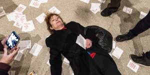 Goldin protesting in a ‘die-in’ the Guggenheim.