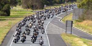 Finks members ride along the Hume Freeway in 2013. 