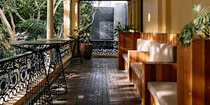 The new private dining area includes a lounge and access to the balcony overlooking Edward Street.