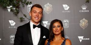 Patrick Cripps,pictured with partner Monique Fontana,had five best on grounds in the opening nine rounds of the count.