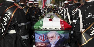 The Iranian Defence Ministry,military personnel stand near the flag-draped coffin of Mohsen Fakhrizadeh,a scientist who was killed on Friday,during a funeral ceremony in Tehran,Iran.