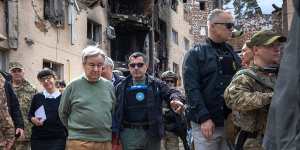 UN Secretary-General Antonio Guterres views homes destroyed during fighting in Irpin outside Kyiv.