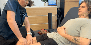 Andre de Ruyter undergoing rehabilitation after being attacked by a bull shark in January.