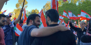Members of the Lebanese-Australian community in Melbourne demonstrate in solidarity with Lebanon's anti-government protesters in Carlton on Wednesday.