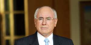 John Howard has urged Dave Sharma to stay in the race. 