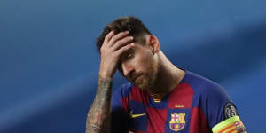 Messi ends row,decides to stay at Barcelona