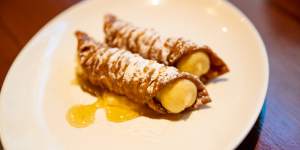 Cannoli filled with a loose creme brulee.