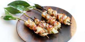 Barbecued blacklip abalone skewers with pancetta at Mimi's. 