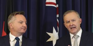 Labor’s climate spokesman Chris Bowen and leader Anthony Albanese. Mr Albanese reminded caucus members on Tuesday he had often said he would “kick with the wind in the fourth quarter” of the election cycle.