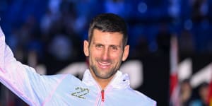 Novak Djokovic lifts the Australian Open trophy for a 10th time. 