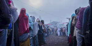 Ethiopians queue in the early morning to cast their votes in the general election in Beshasha on Monday.