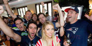 Waitress Emma King and Super Bowl fans in Paddington in 2015.