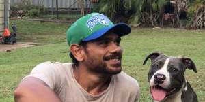 Cyril Rioli with his much-loved dogs,Koda and Kenai.