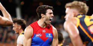 Winning with feeling:Melbourne’s Christian Petracca celebrates a goal against Adelaide.