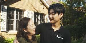 Cathy Cao with her son Jaclyn Yang at her home in Roseville.