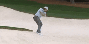 Cameron Smith plays out of a bunker during the 2023 Masters with a fairway driver.