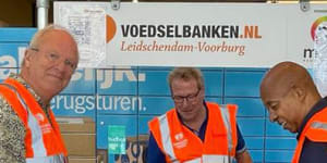 Volunteers prepare donations at the food bank in Leidschendam-Voorburg in the Netherlands,where hundreds of families rely on handouts to avoid going hungry.