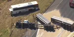 Commuter chaos in western Melbourne after truck rollover and bridge strike